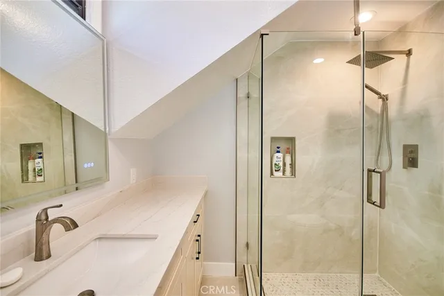a view of balcony with wooden floor and potted plants