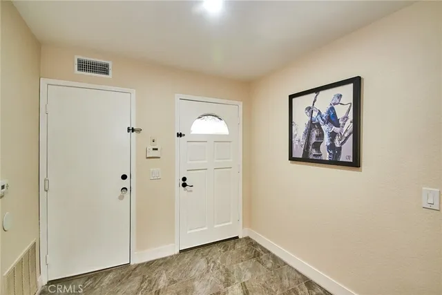 a view of a hallway with closet