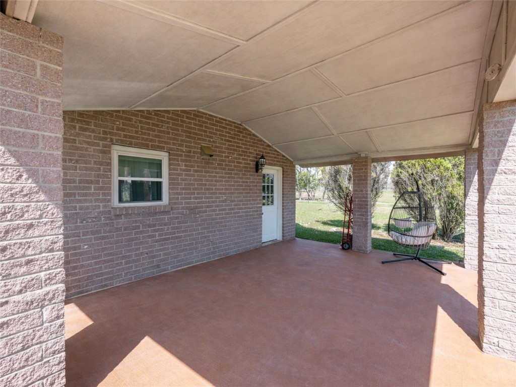 6534 FM 3180 Road Baytown, TX 77523 - Photo 16 of 34 covered back patio (ai removed hot tub that is not included)