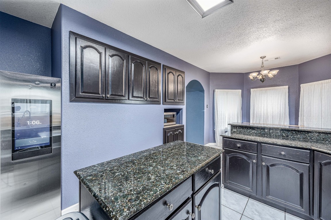 6534 FM 3180 Road Baytown, TX 77523 - Photo 27 of 34 kitchen island and extra cabinet space