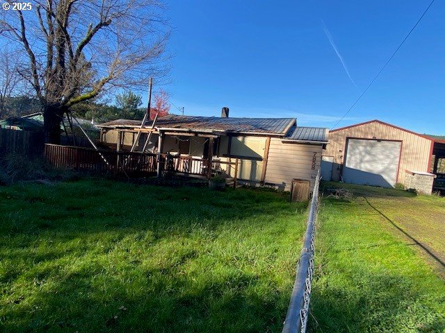 7858 Nonpareil Road Sutherlin, OR 97479 - Photo 2 of 14 a view of a house with a backyard