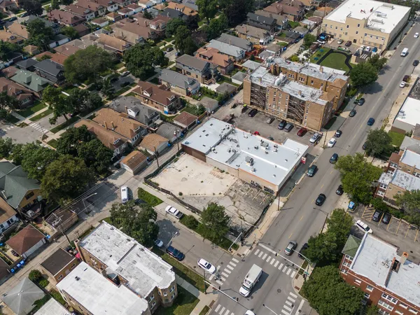 an aerial view of a city with lots of residential buildings