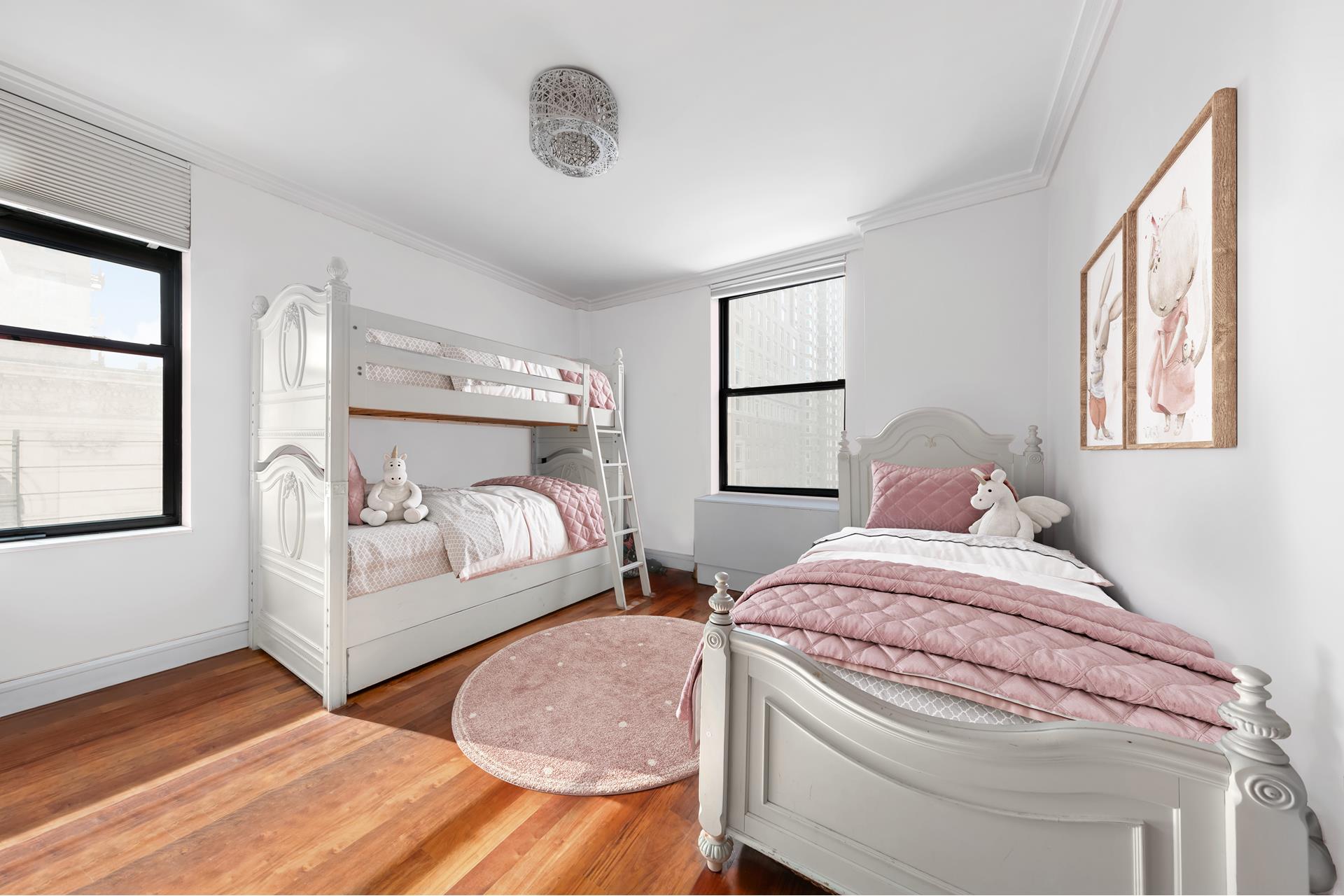 219 West 81st Street, Unit 4A Manhattan, NY 10024 - Photo 10 of 21 a bedroom with two beds and a large window