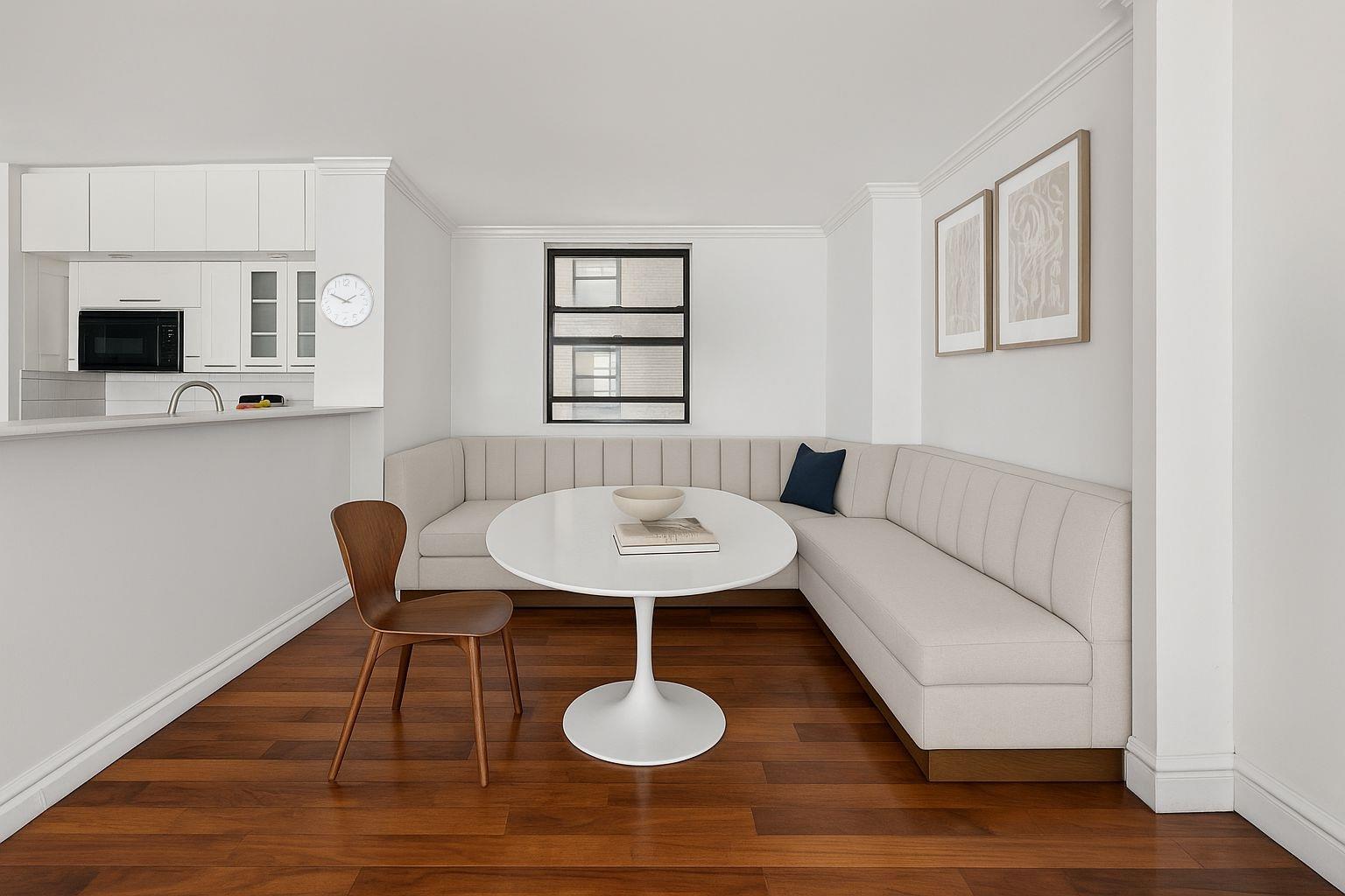 219 West 81st Street, Unit 4A Manhattan, NY 10024 - Photo 5 of 21 a living room with furniture and a wooden floor