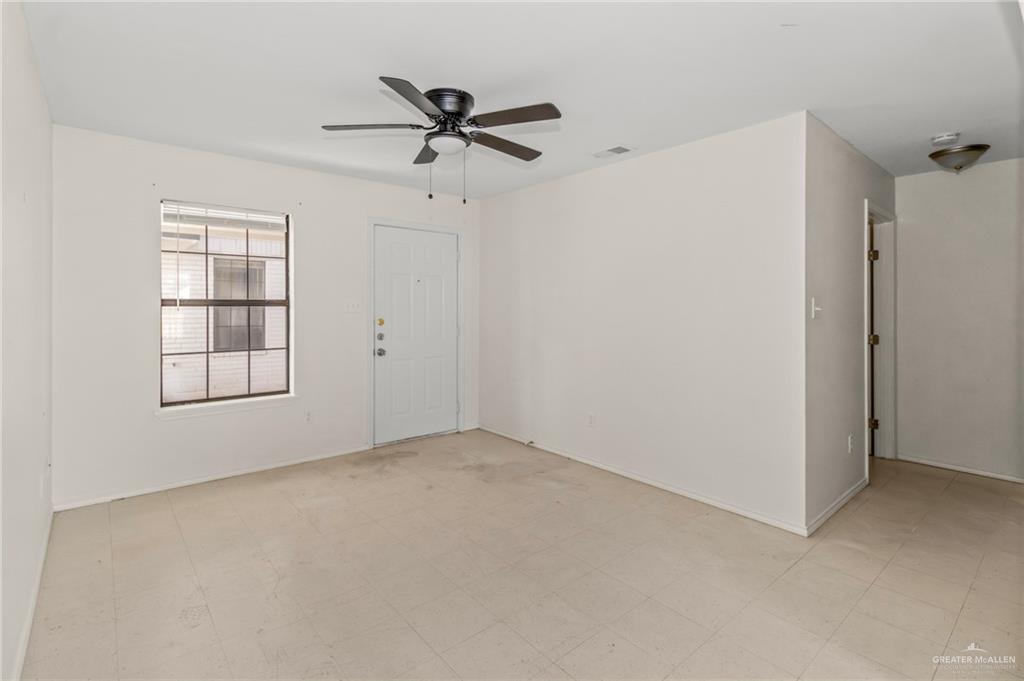 4601 South 24th Street, Unit 7 McAllen, TX 78503 - Photo 2 of 7 Unfurnished room with a ceiling fan and light flooring