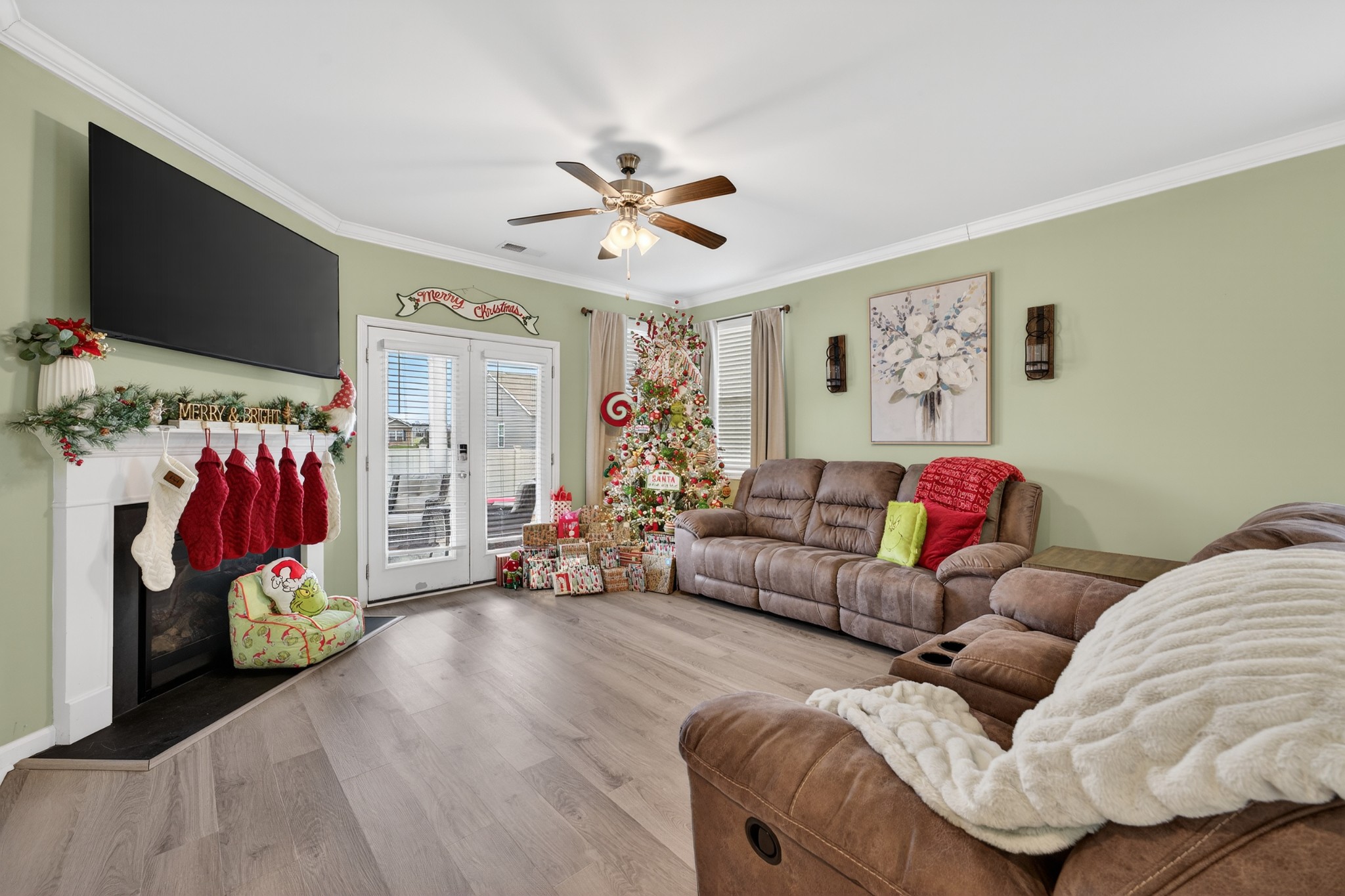 306 William Dylan Drive Murfreesboro, TN 37129 - Photo 14 of 47 a living room with furniture a flat screen tv and a couch