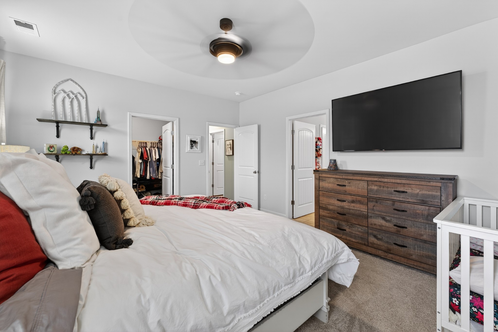 306 William Dylan Drive Murfreesboro, TN 37129 - Photo 19 of 47 a bedroom with a bed and a flat screen tv