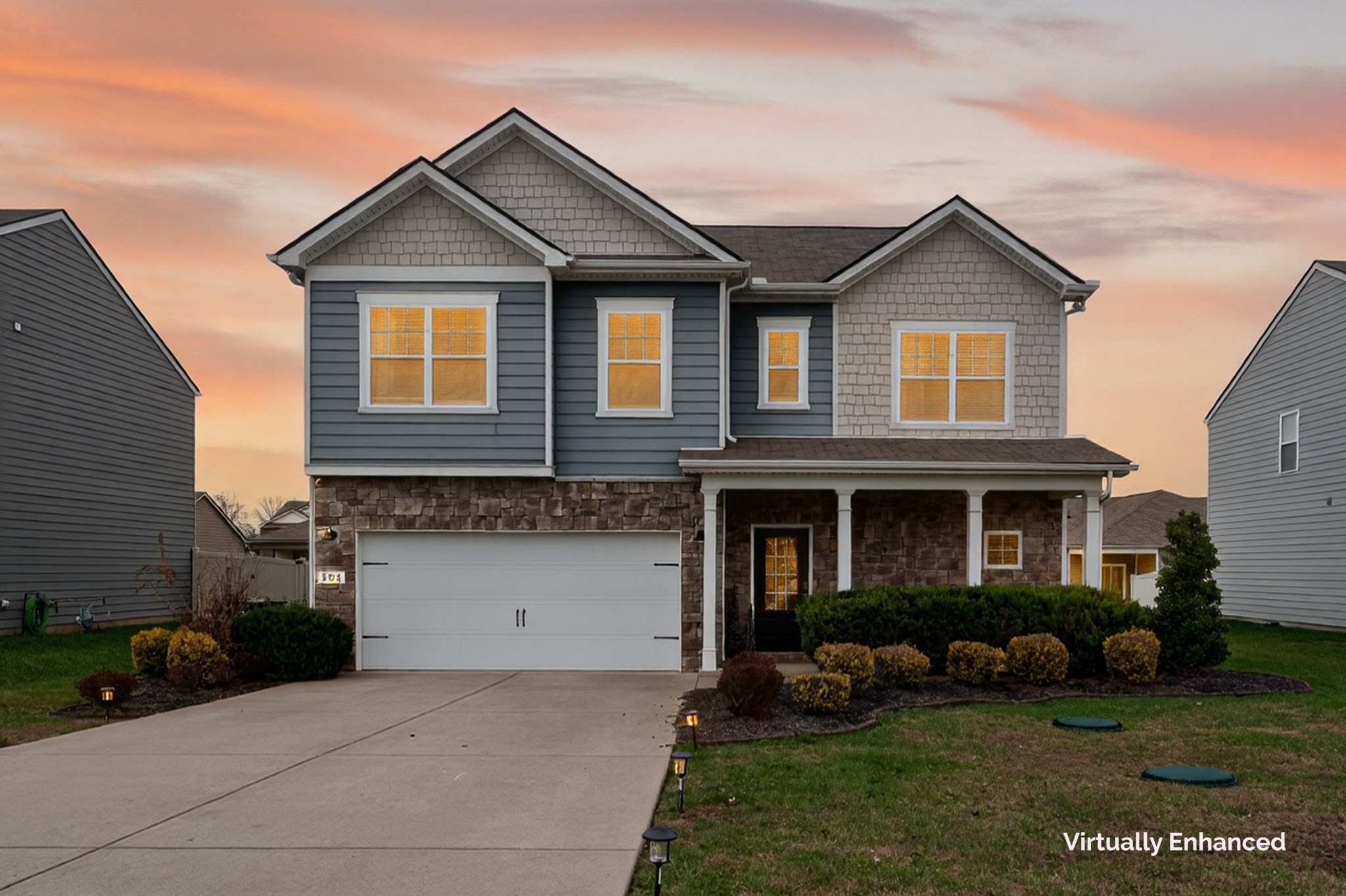 306 William Dylan Drive Murfreesboro, TN 37129 - Photo 2 of 47 a front view of a house with a yard and garage
