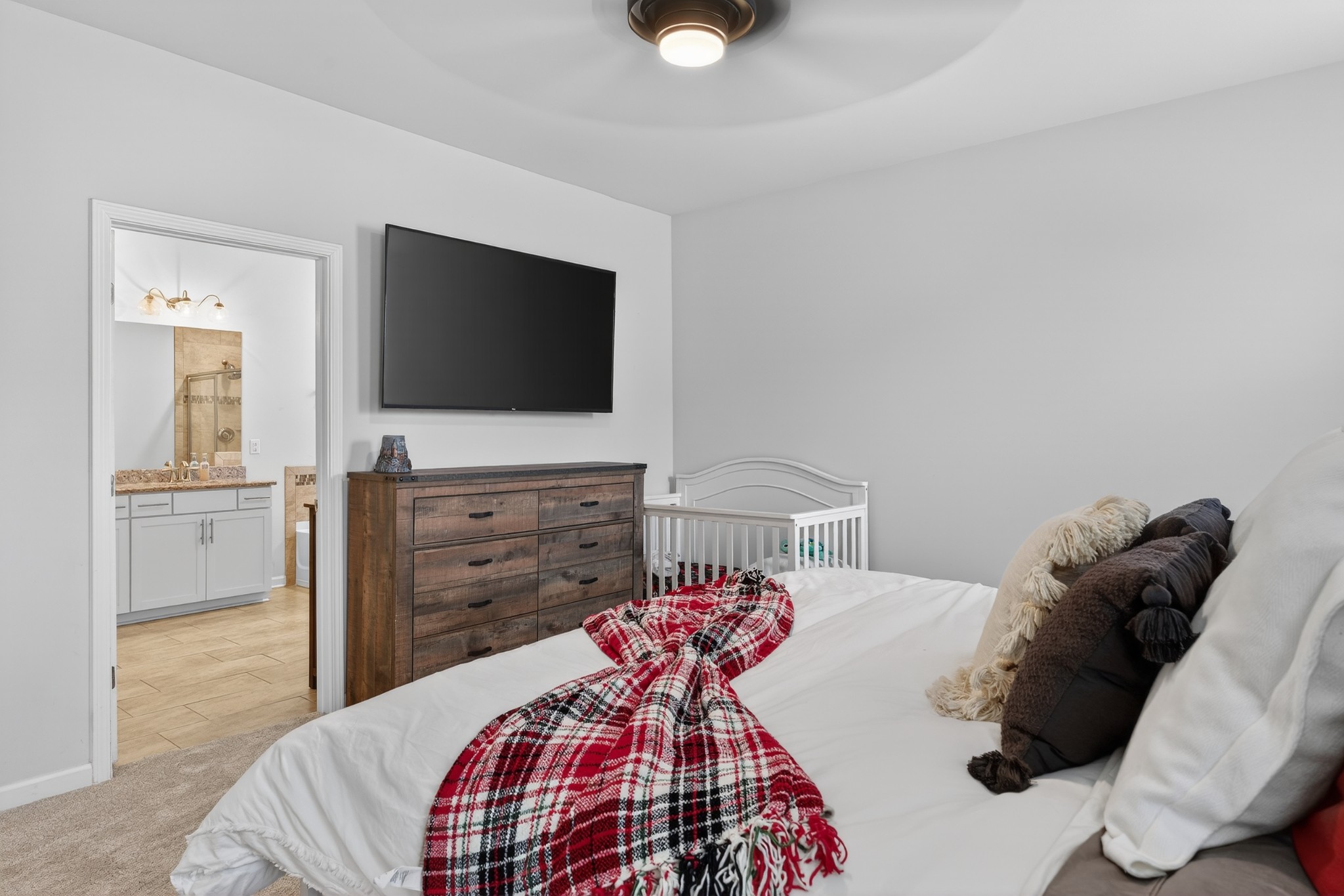 306 William Dylan Drive Murfreesboro, TN 37129 - Photo 21 of 47 a bedroom with a bed and a flat screen tv