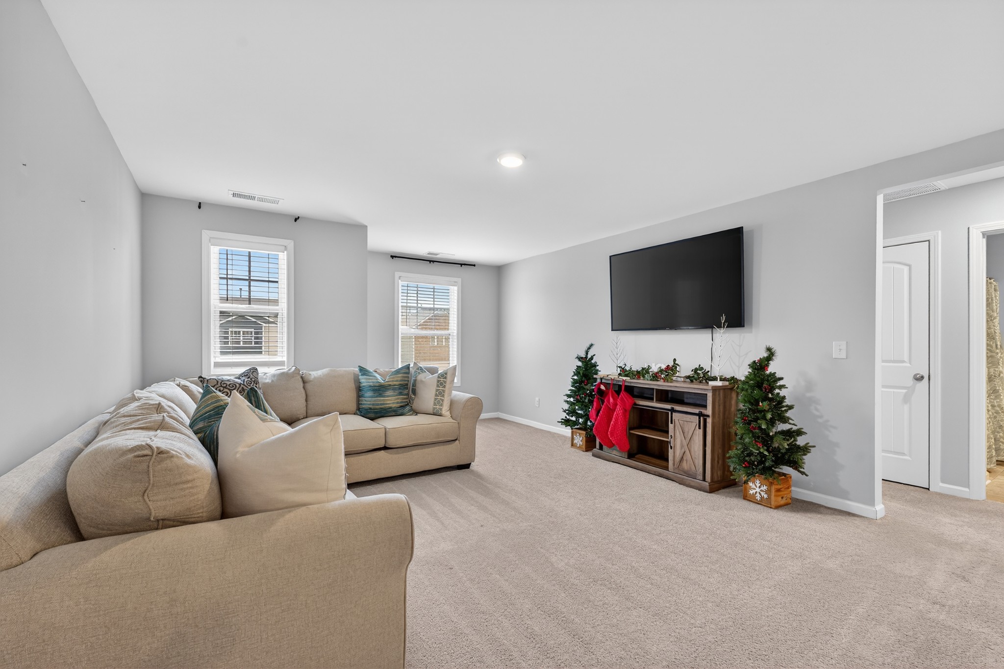 306 William Dylan Drive Murfreesboro, TN 37129 - Photo 24 of 47 a living room with furniture and a flat screen tv