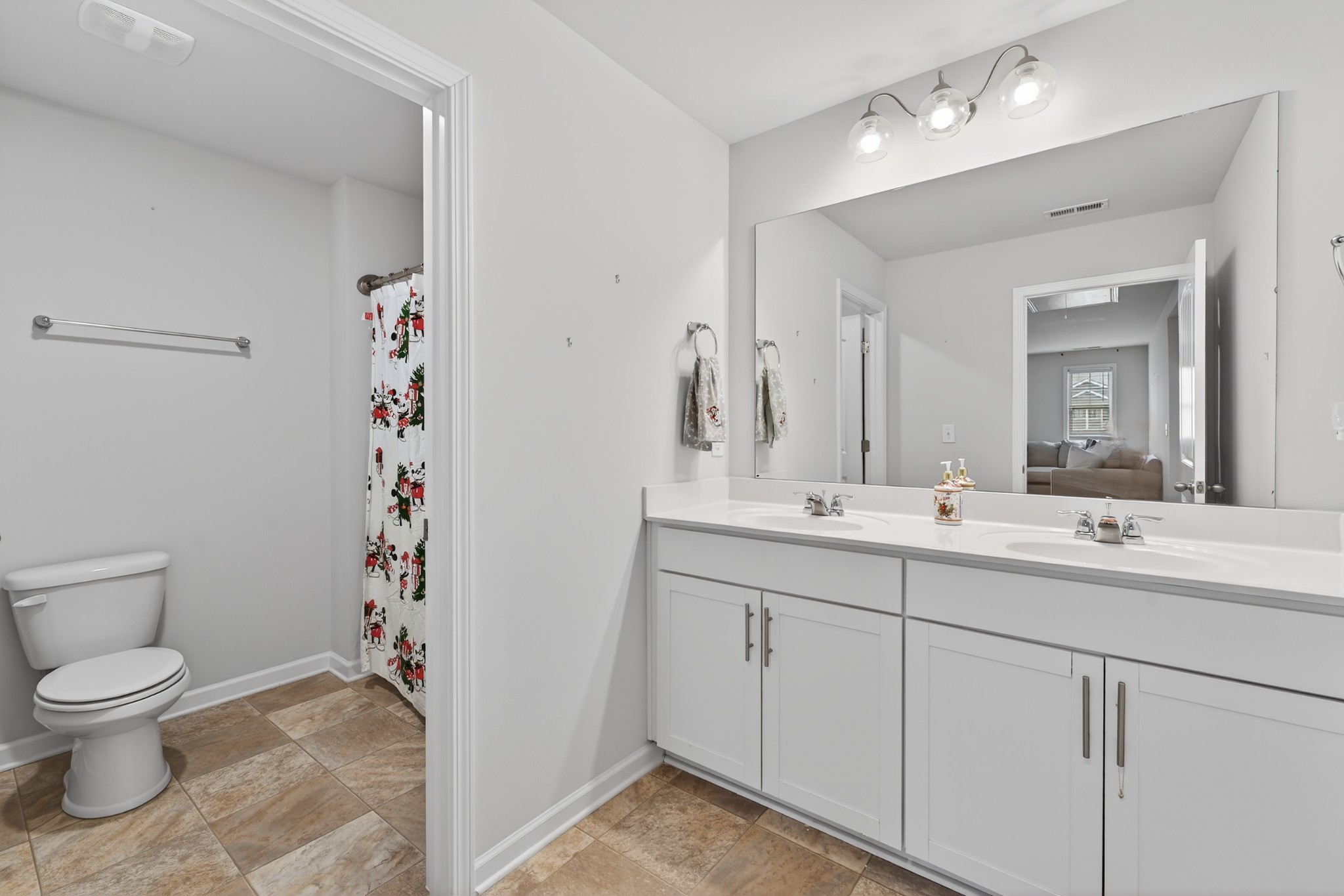 306 William Dylan Drive Murfreesboro, TN 37129 - Photo 26 of 47 a bathroom with a toilet sink and shower