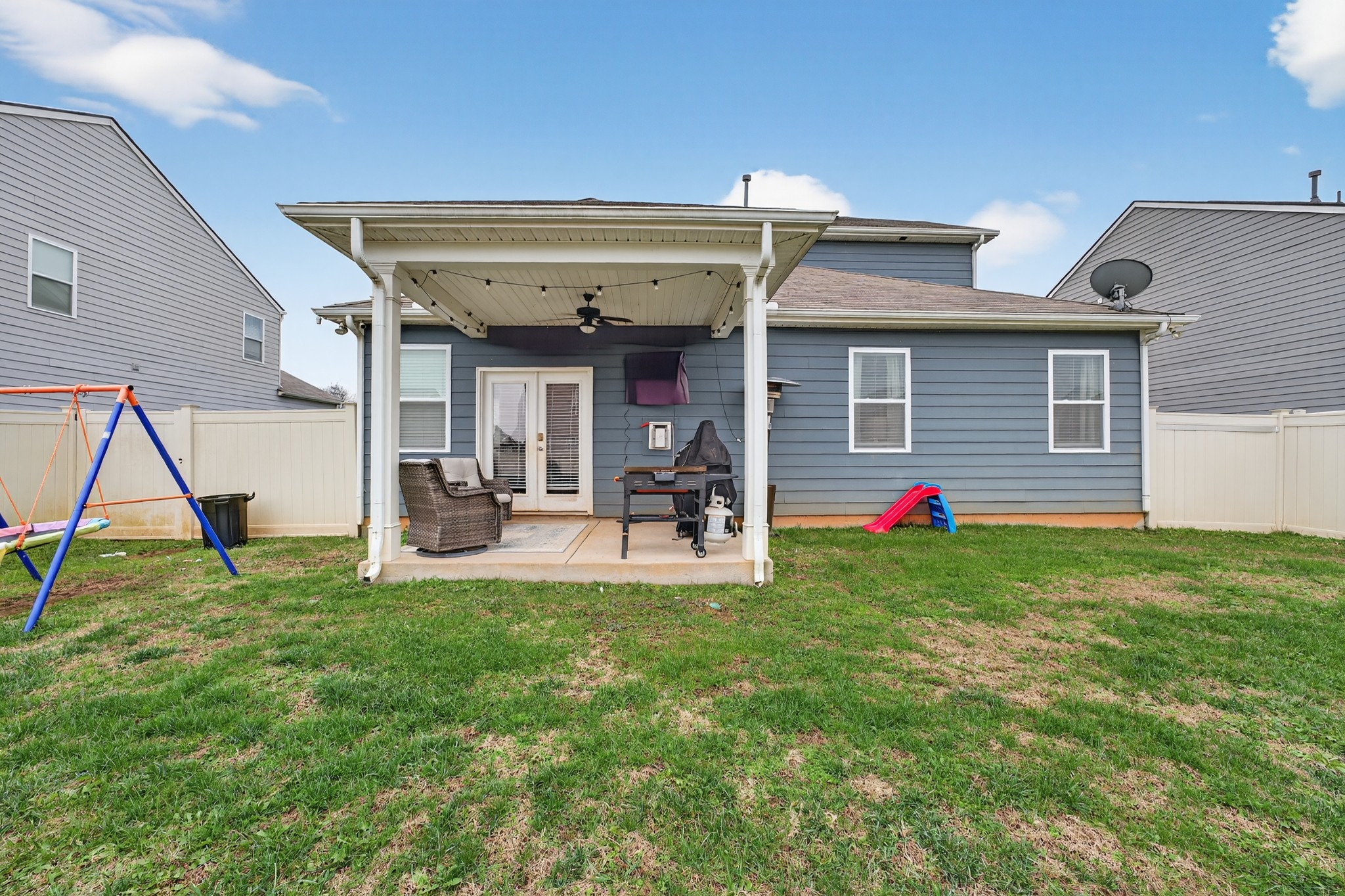 306 William Dylan Drive Murfreesboro, TN 37129 - Photo 38 of 47 a view of a house with table and chairs