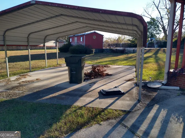 a view of a porch with furniture