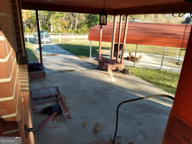 a view of a room with a large window