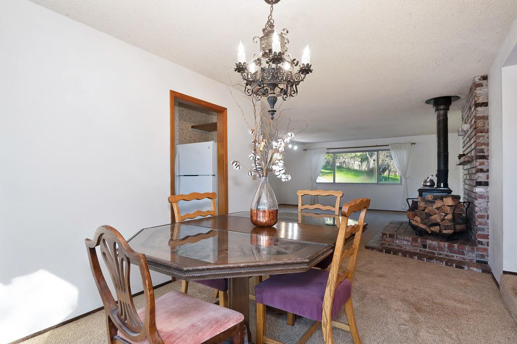 4656 Cosumnes View Trail Placerville, CA 95667 - Photo 16 of 58 a dining room with furniture and chandelier