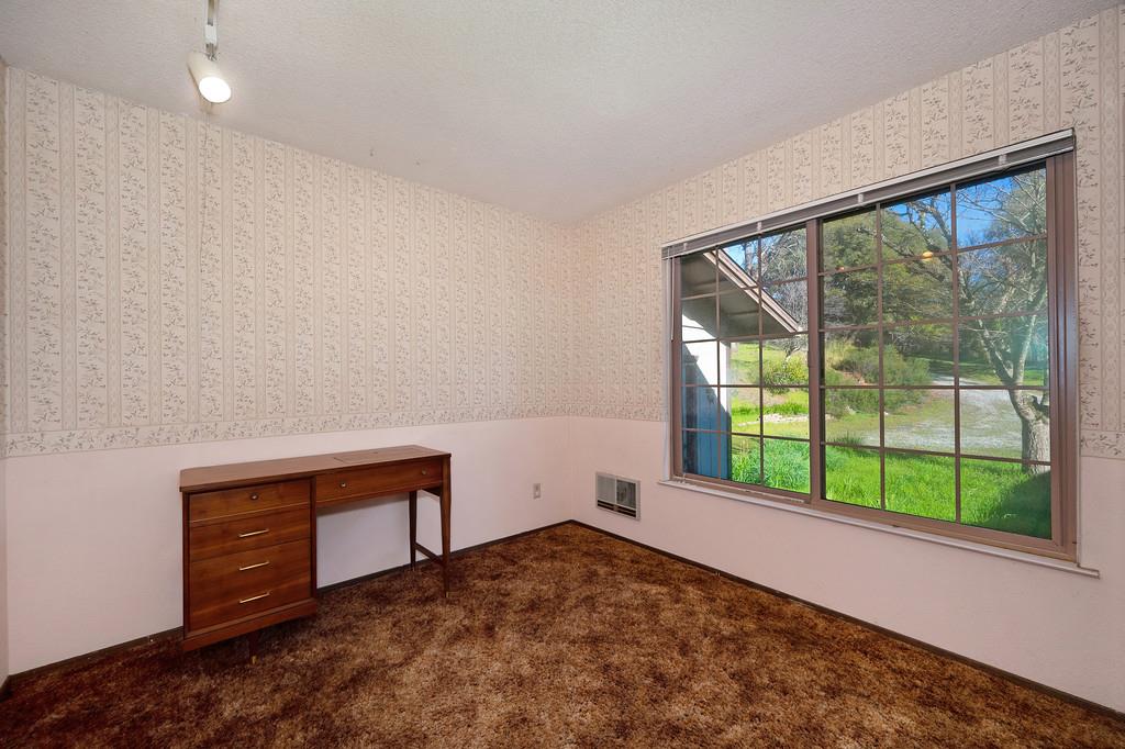 4656 Cosumnes View Trail Placerville, CA 95667 - Photo 30 of 58 a view of an empty room with a window