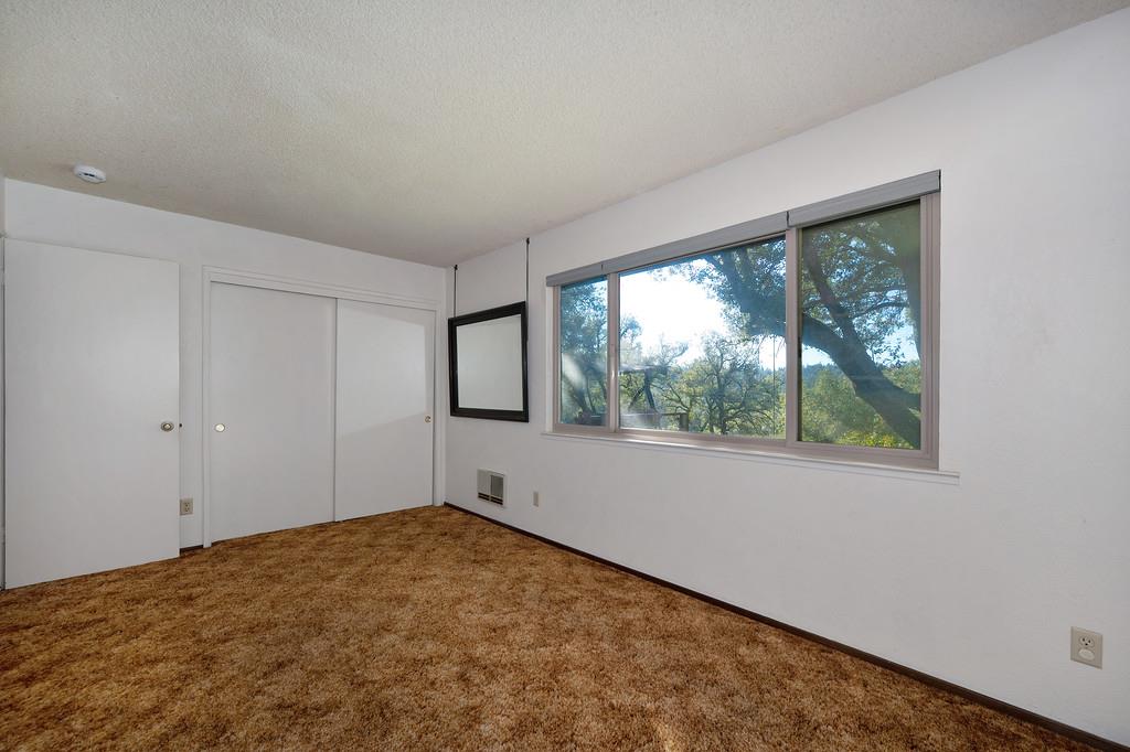 4656 Cosumnes View Trail Placerville, CA 95667 - Photo 33 of 58 a view of an empty room with a window