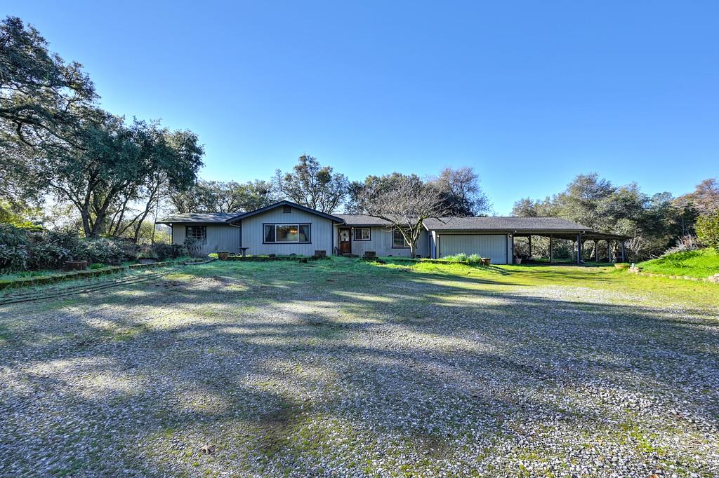 4656 Cosumnes View Trail Placerville, CA 95667 - Photo 5 of 58 a view of a house with a big yard