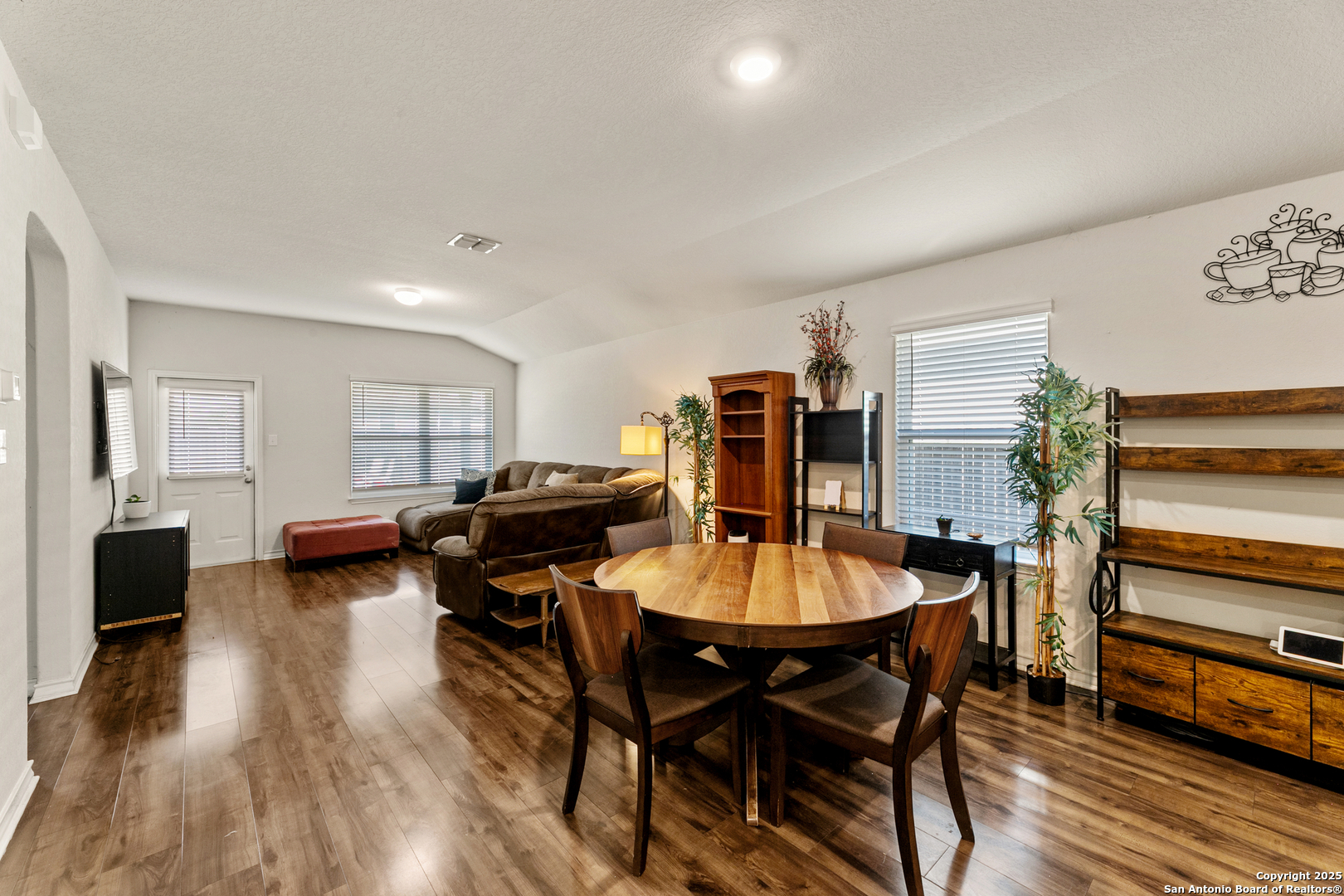 9711 Bratten Rise San Antonio, TX 78254 - Photo 6 of 19 a dining room with furniture and wooden floor