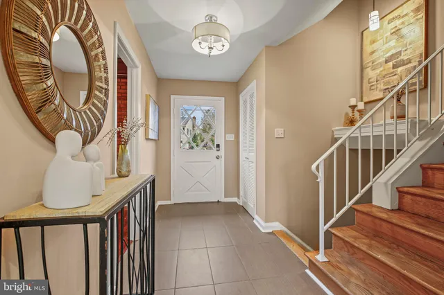 a view of entryway with wooden floor