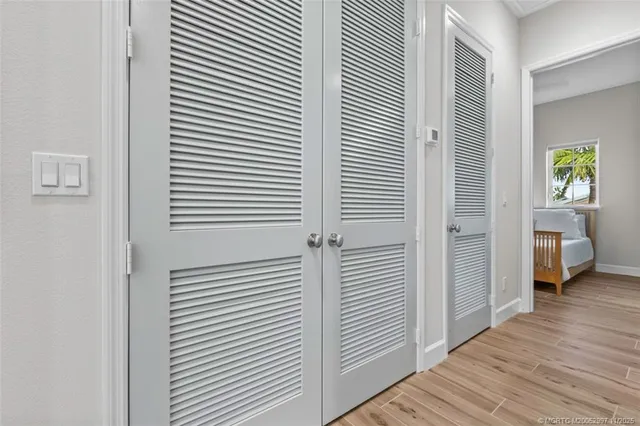 a view of a bedroom from a hallway