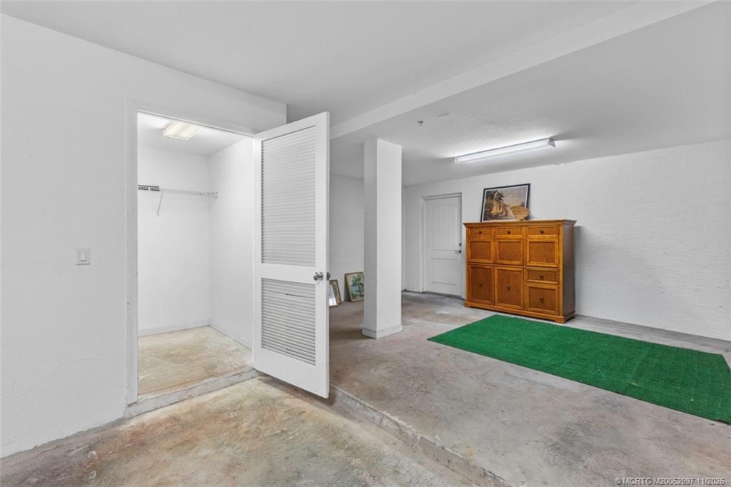 1577 Bow Line Road Fort Pierce, FL 34949 - Photo 32 of 49 a view of a room with garage and a chair