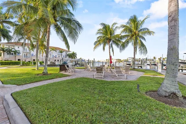 a view of outdoor space with palm trees