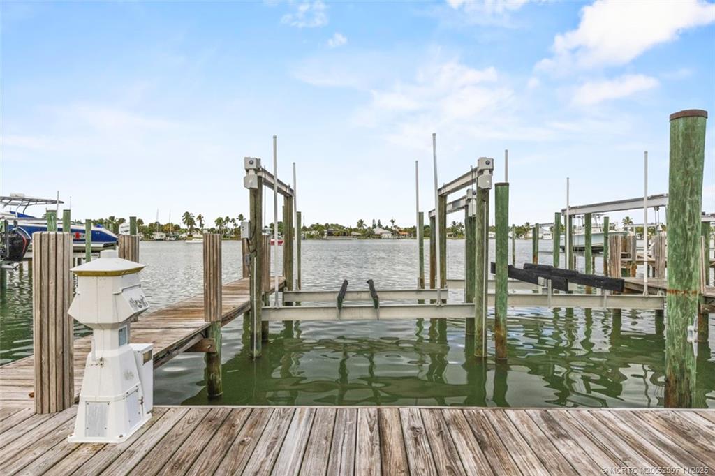 1577 Bow Line Road Fort Pierce, FL 34949 - Photo 37 of 49 a view of a lake from a balcony
