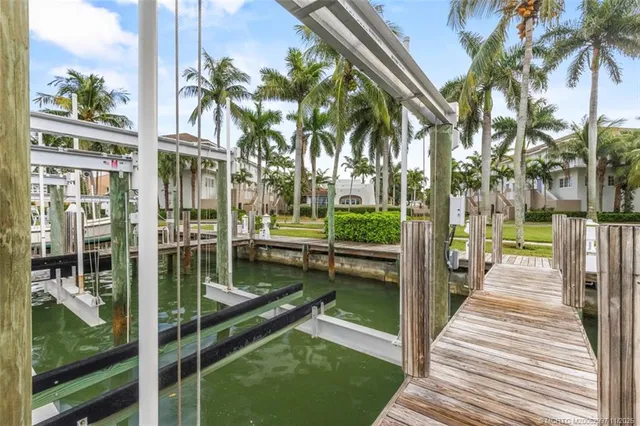 a balcony with view of swimming pool