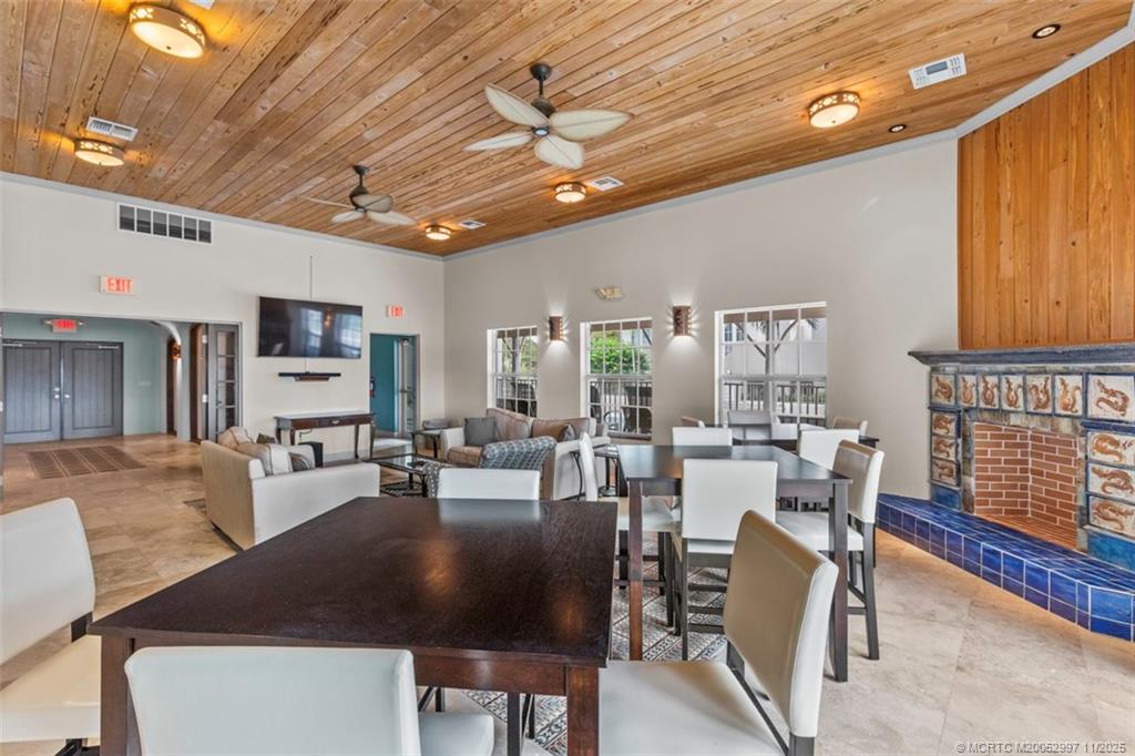 1577 Bow Line Road Fort Pierce, FL 34949 - Photo 46 of 49 a view of a dining room with furniture window and wooden floor