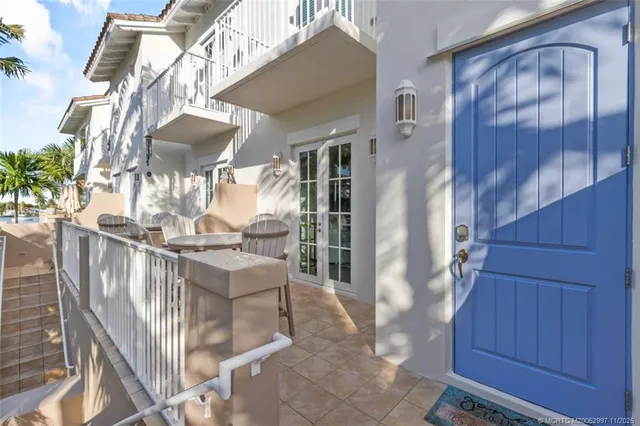 a view of living room kitchen and entryway