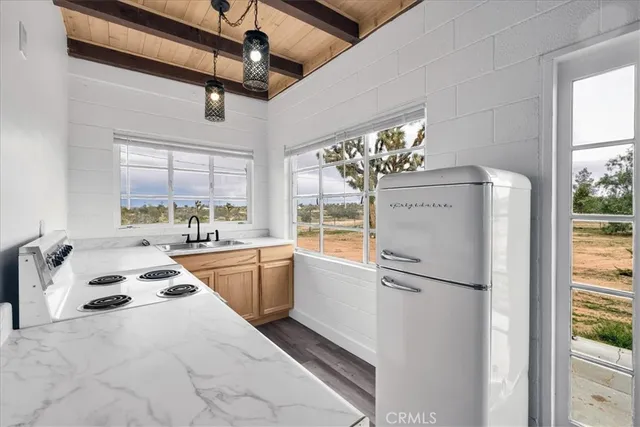 a utility room with washer and dryer