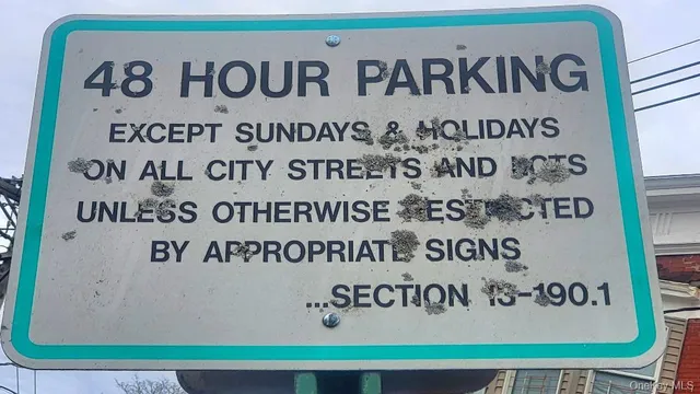 a view of a street with cars