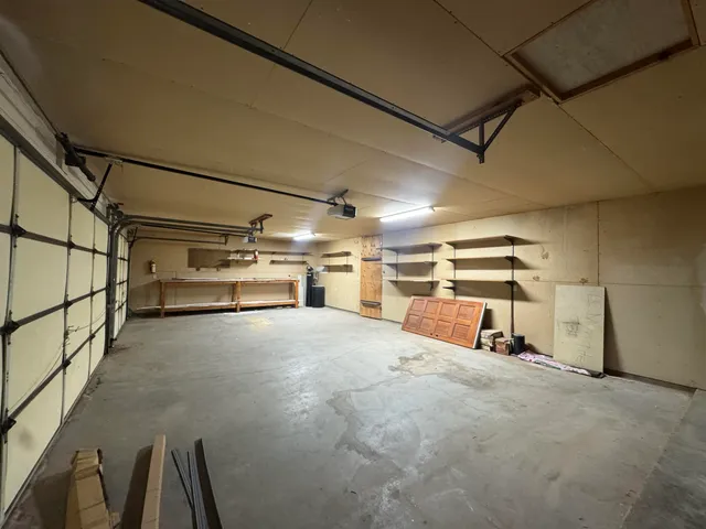 a couple of potted plants in front of door