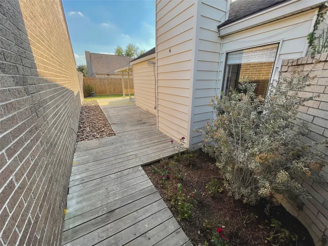 a view of a backyard of the house