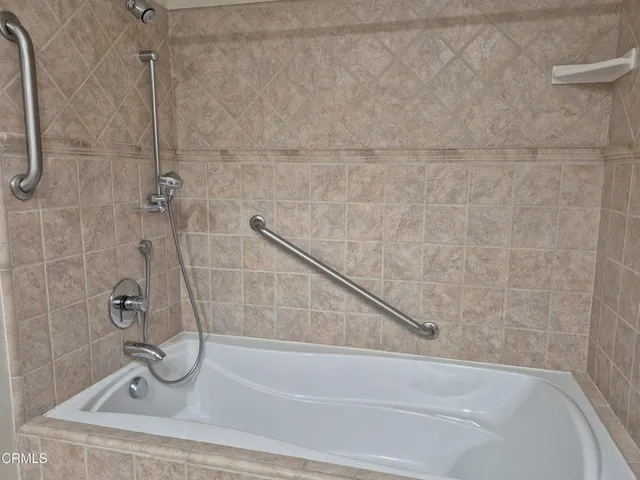 a bathroom with a bathtub