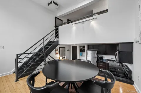 a dining room with furniture