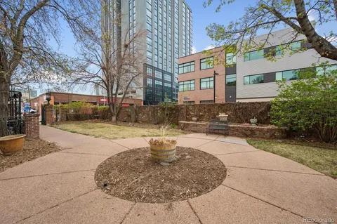 a view of a building with a yard