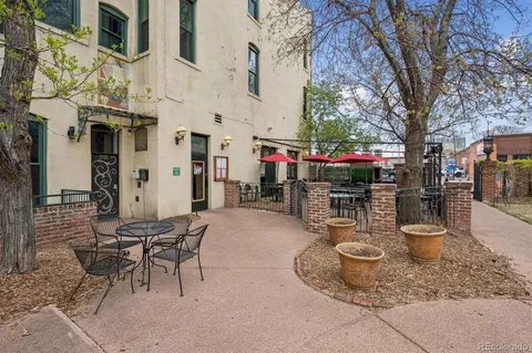 a view of a chairs and tables in the patio