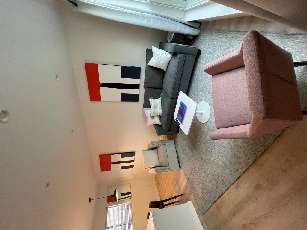 1714 Enfield Road, Unit 102 Austin, TX 78703 - Photo 2 of 7 a living room with furniture and a couch