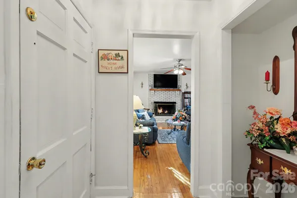 a view of living room with furniture and flat screen tv