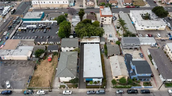 an aerial view of residential house with a yard