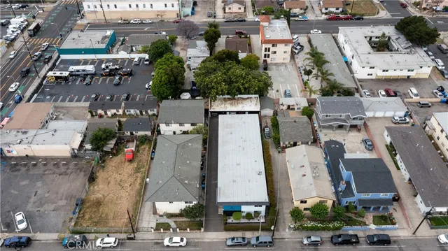 an aerial view of residential house with a yard
