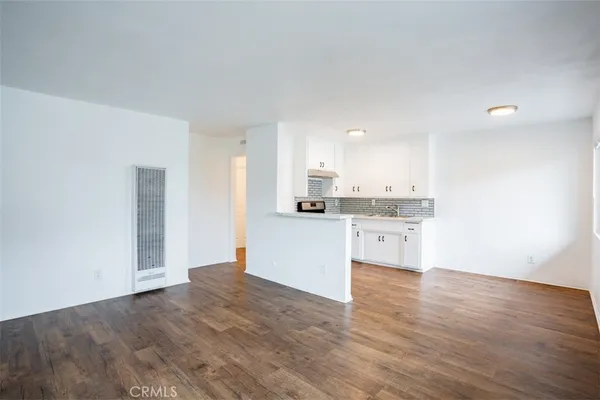 a view of kitchen with wooden floor