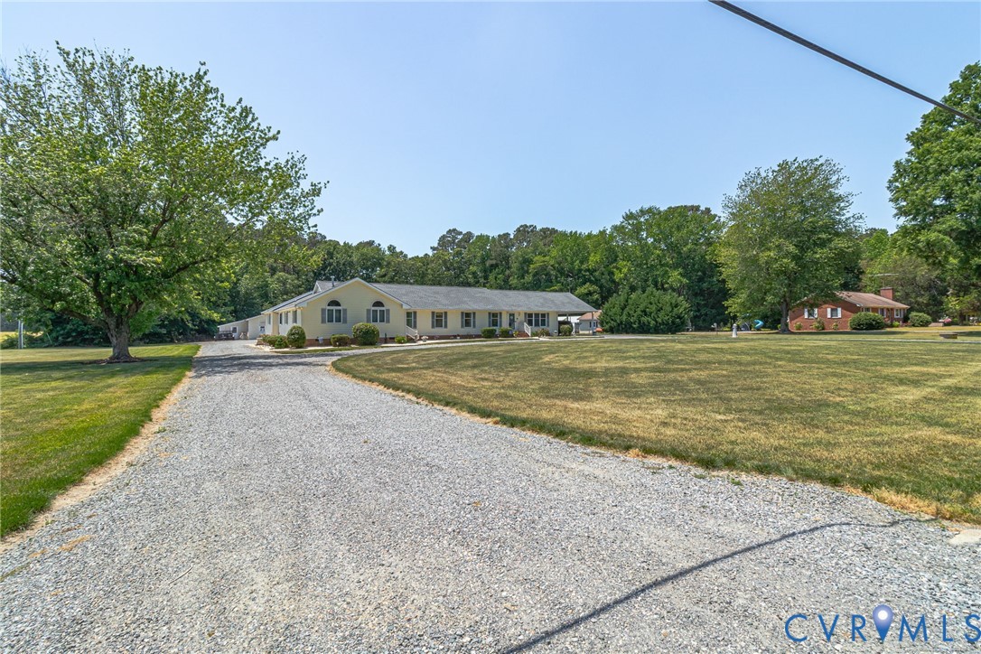 4400 Hacks Neck Road Heathsville, VA 22473 - Photo 69 of 78 a view of a house with a big yard