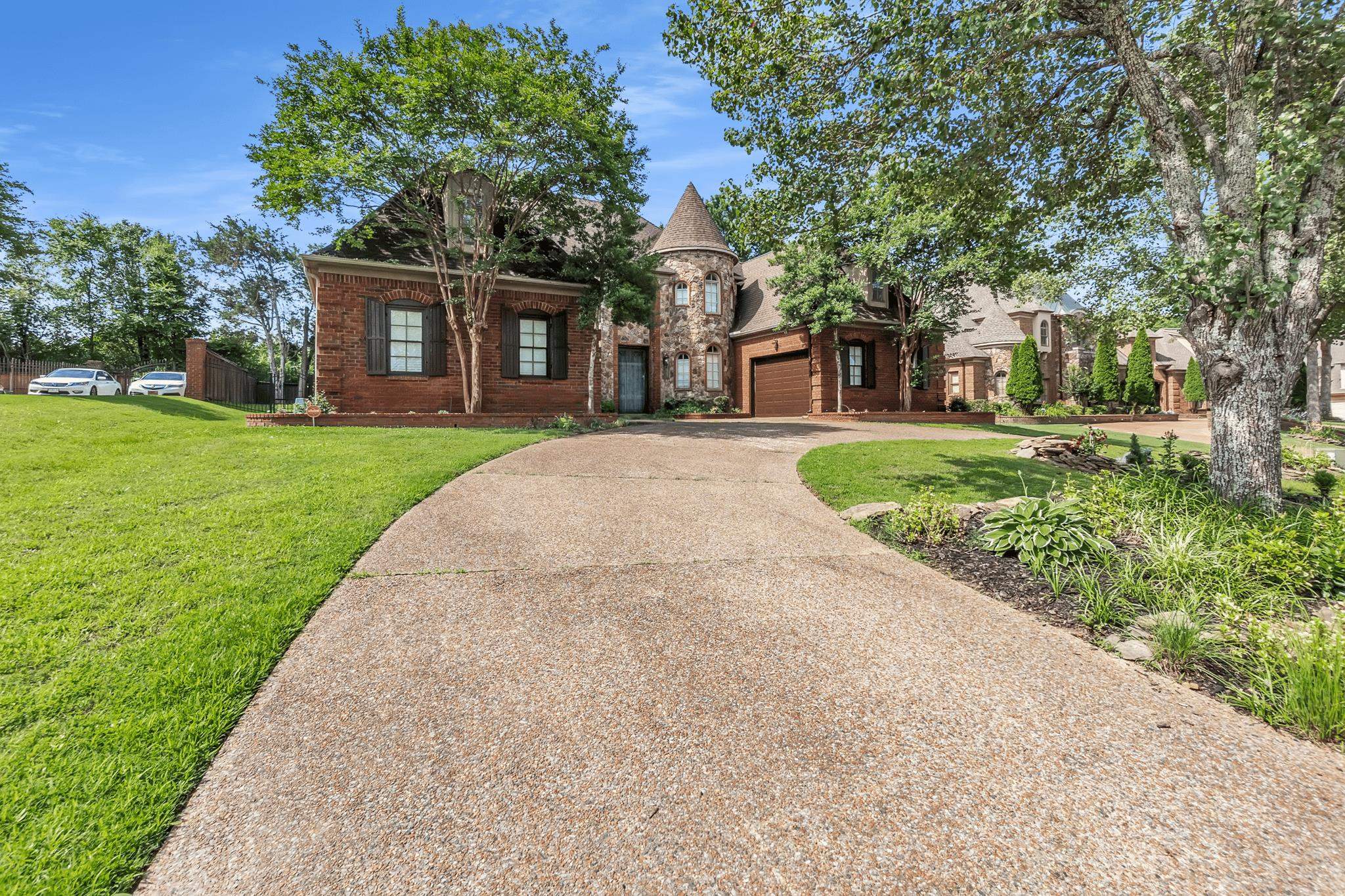 649 Ridge Springs Road Collierville, TN 38017 - Photo 2 of 38 Stone and brick facade residence with a turret detail