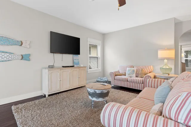 a bedroom with a bed and a table