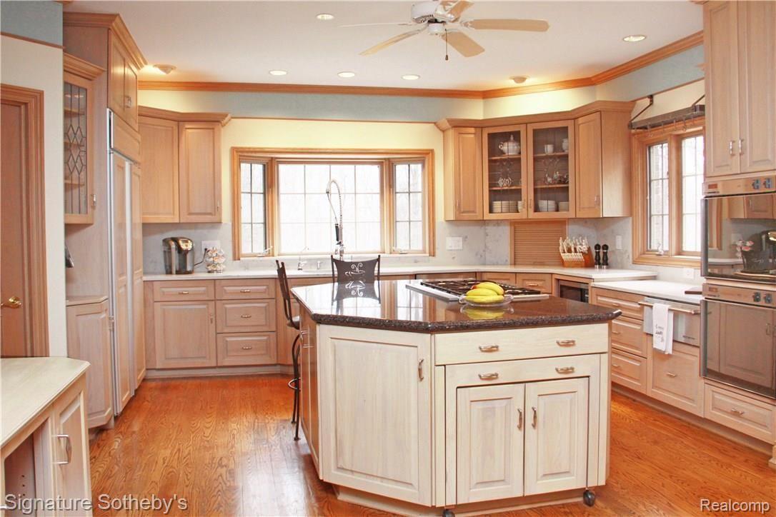 8400 Ridge Road Canton, MI 48187 - Photo 13 of 69 Expanding Island Table offers plenty of room for entertaining.