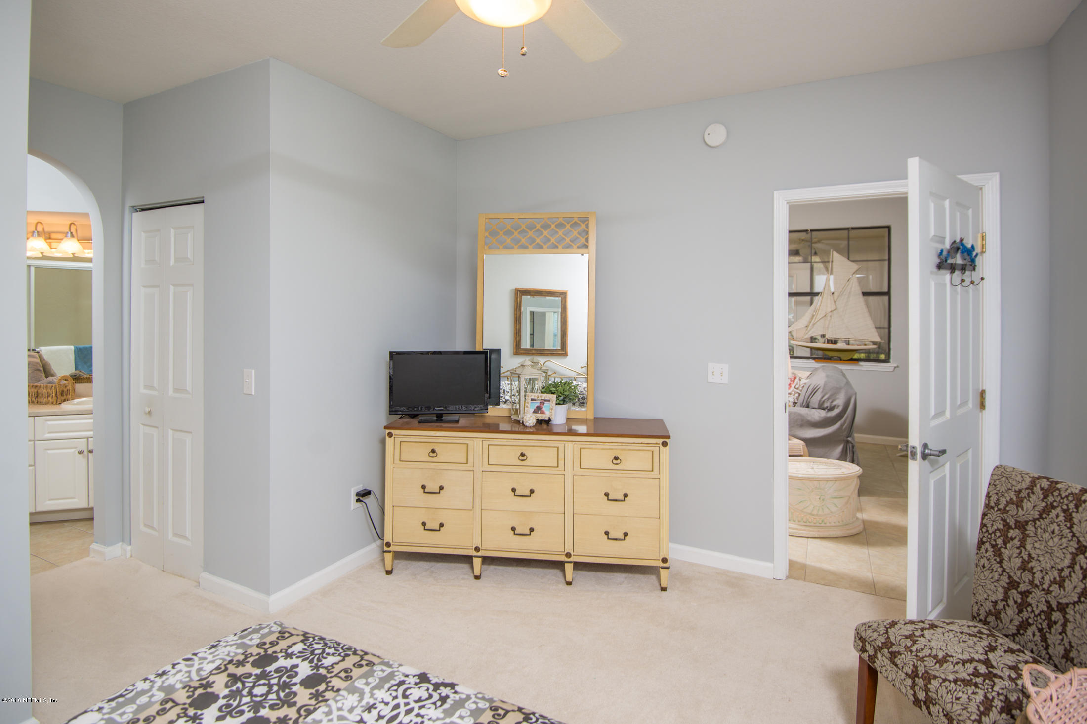 3210 Haley Pointe Road St. Augustine, FL 32084 - Photo 23 of 44 a room with furniture and mirror