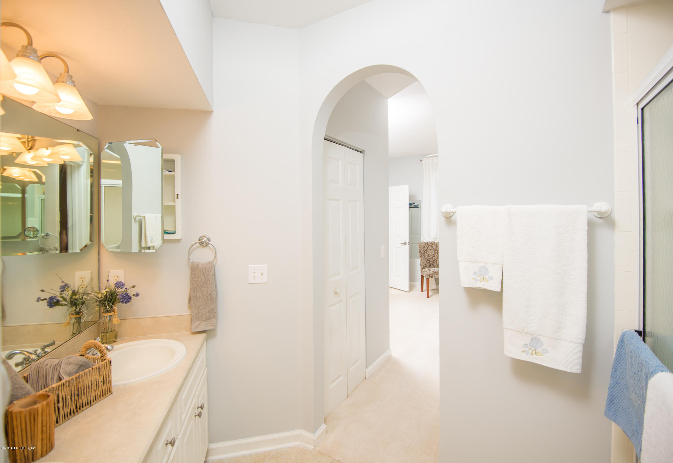 3210 Haley Pointe Road St. Augustine, FL 32084 - Photo 26 of 44 a bathroom with a tub sink and mirror